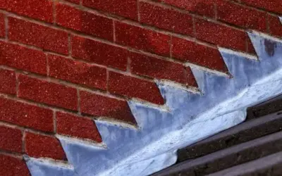 How Roof Flashing & Siding Prevent Long-Term Flat Roof Damage