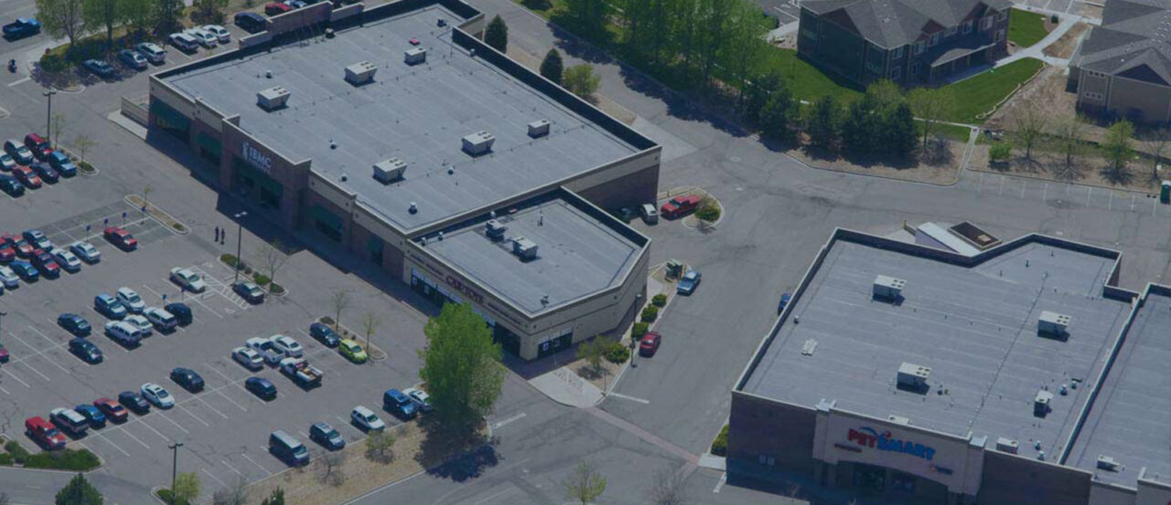 expansive commercial flat roofing in Canada